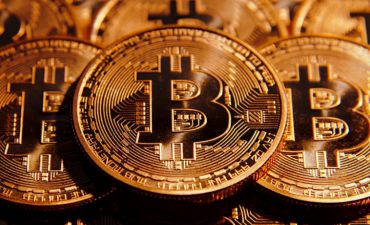 Bitkoin 9 min dollar həddini keçdi